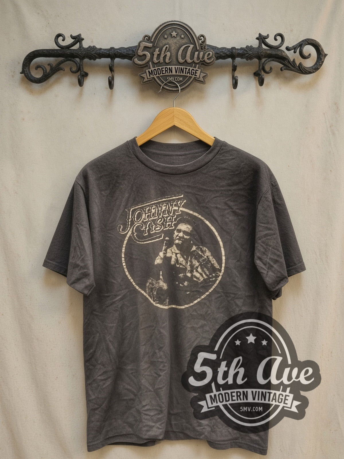 Johnny Cash Circle Portrait vintage band t-shirt, front view on a display rack