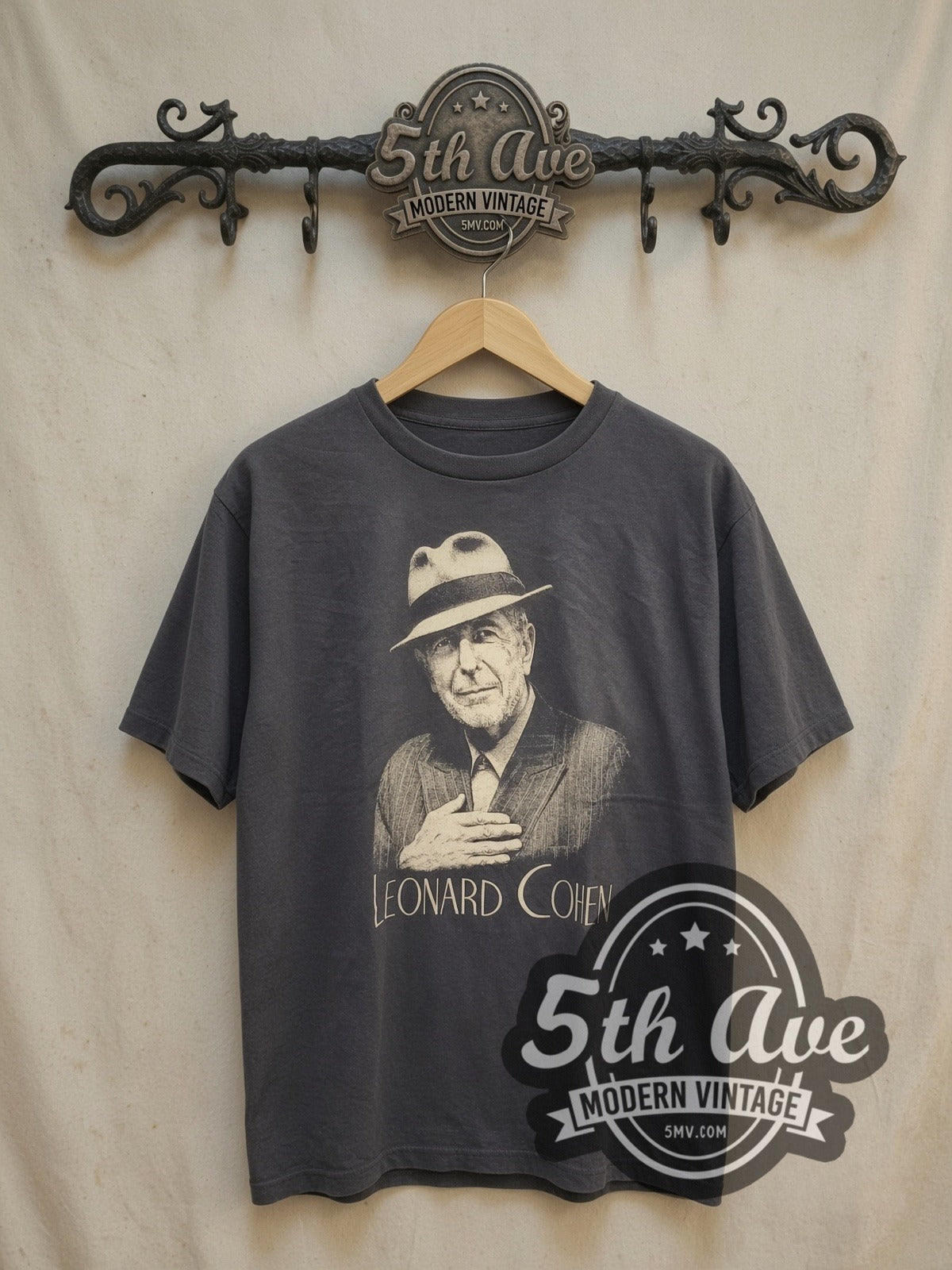 Leonard Cohen Inspired Portrait Cotton vintage band t-shirt, front view on a display rack