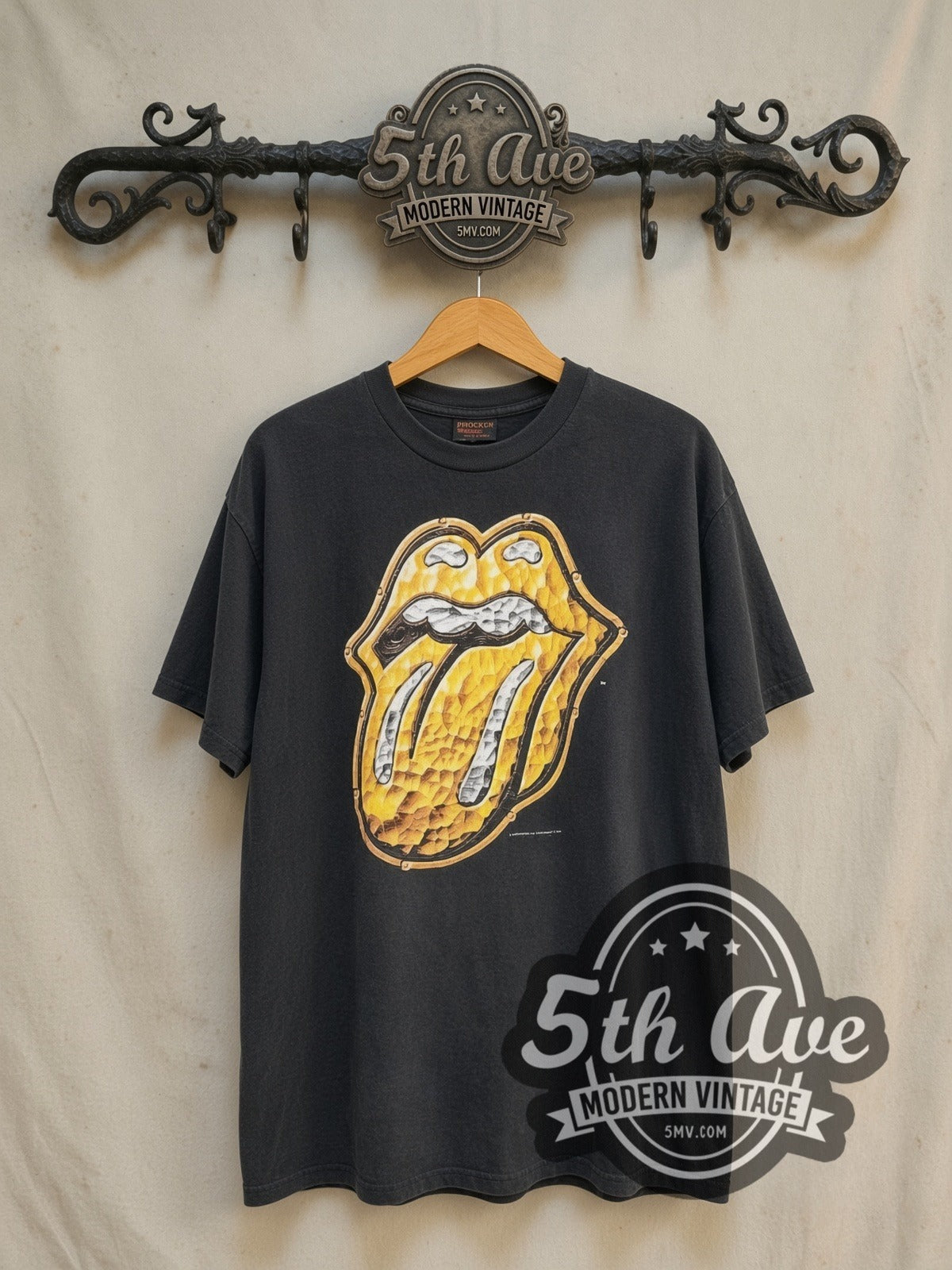 The Rolling Stones Bridges to Babylon Tour 1997-1998 vintage band t-shirt in black, front view on a display rack