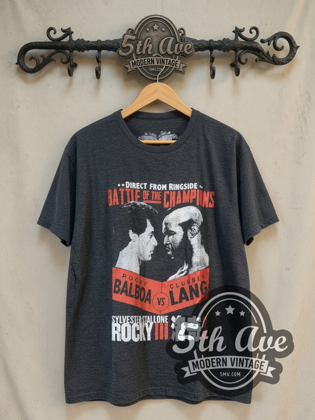 Rocky III vintage graphic t-shirt, front view on a display rack