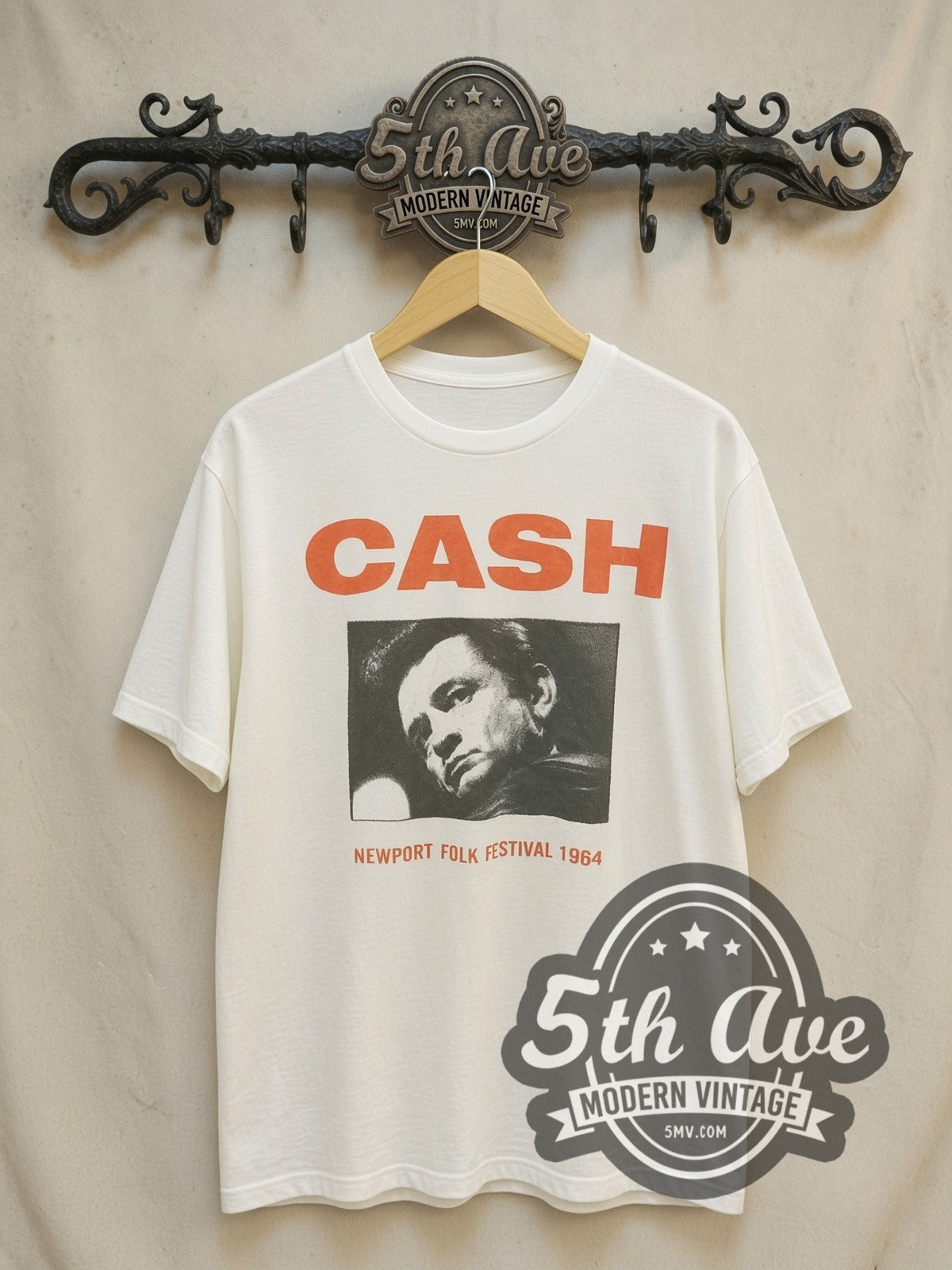 Johnny Cash Newport Folk Festival 1964 vintage band t-shirt, front view on a display rack