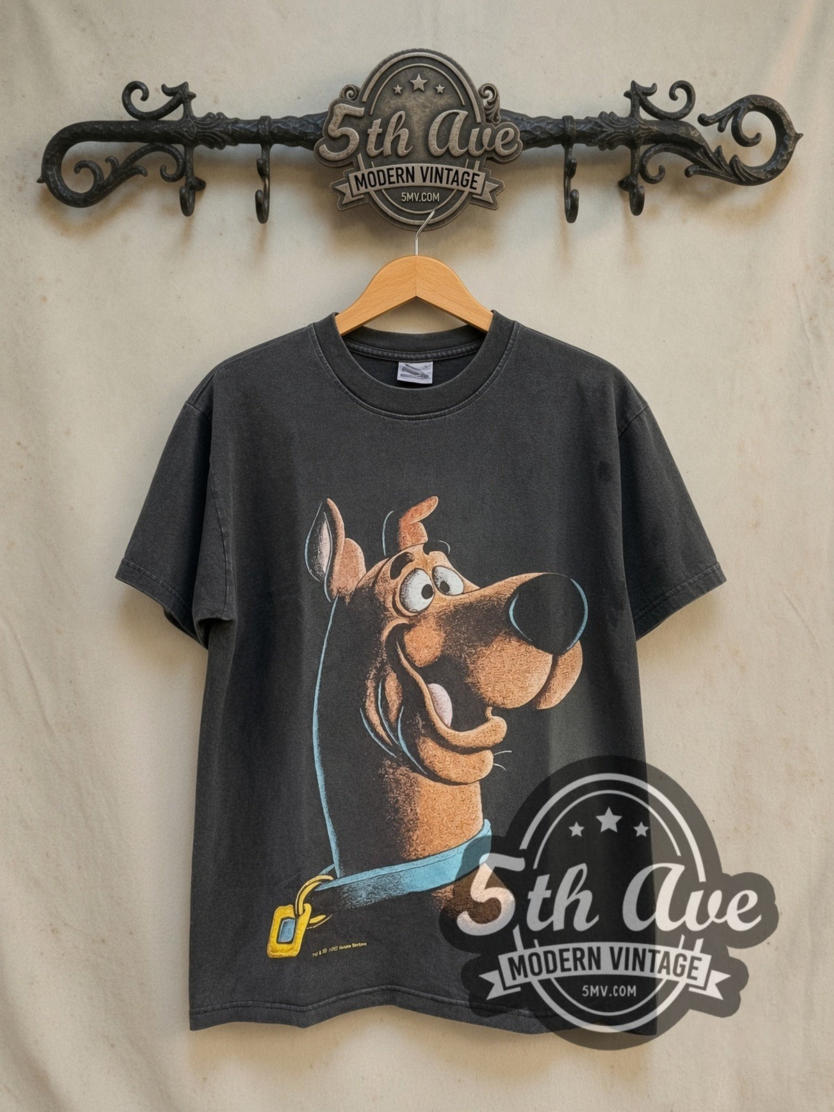 Scooby-Doo Where Are You? Ruh-Roh! vintage cartoon tee in black, front view on a display rack