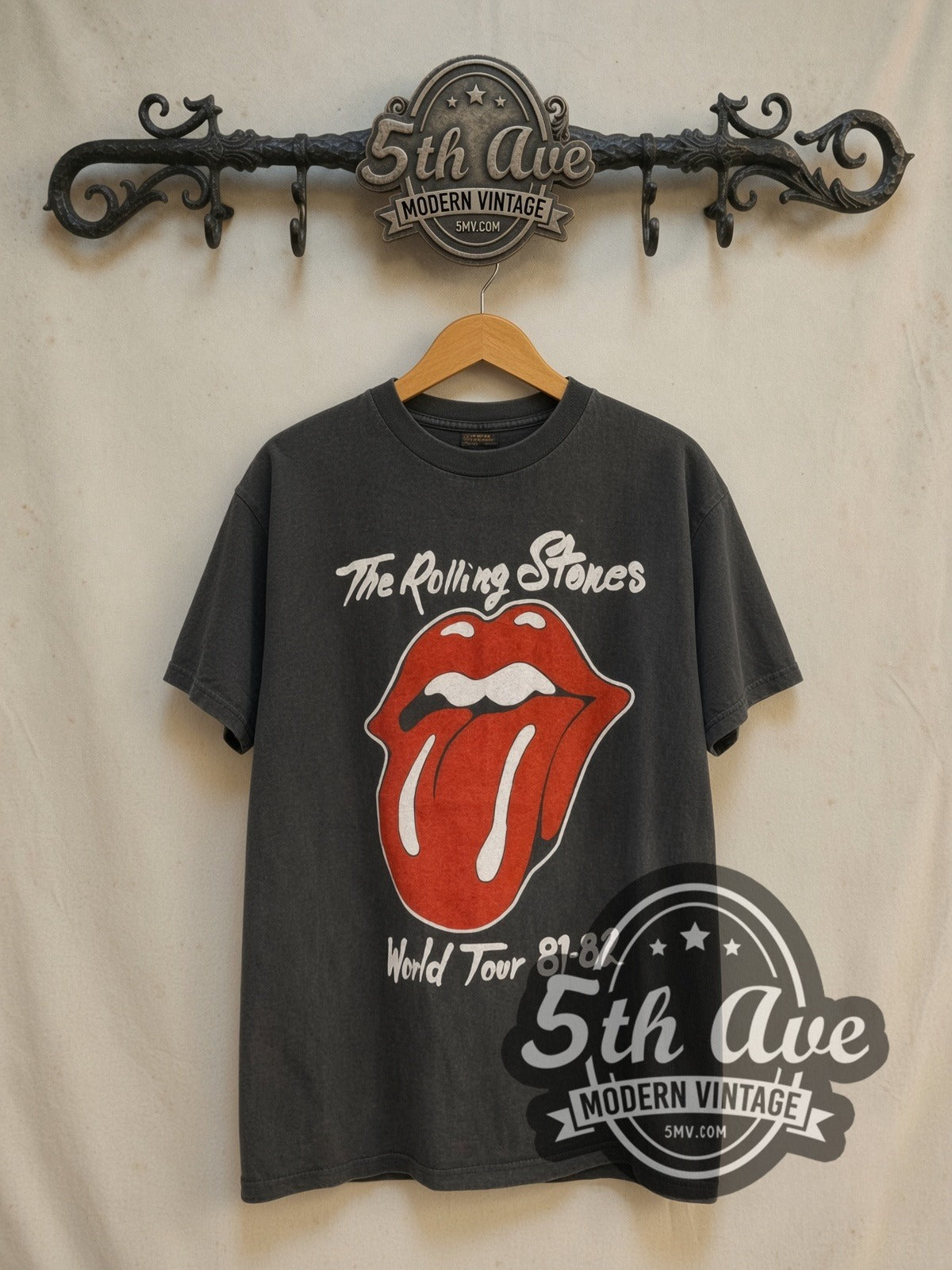 The Rolling Stones World Tour 1981-1982 vintage band t-shirt in black, front view on a display rack