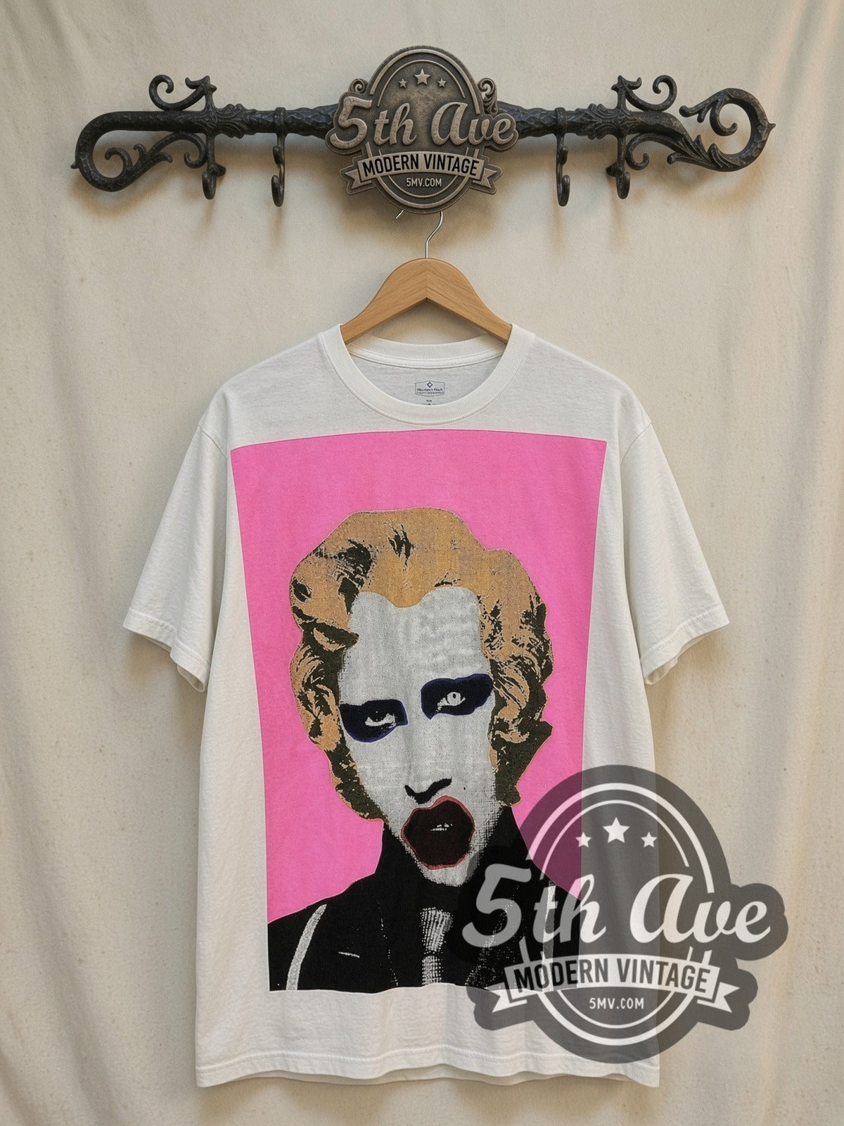 Marilyn Manson Pop Art vintage band t-shirt, front view on a display rack