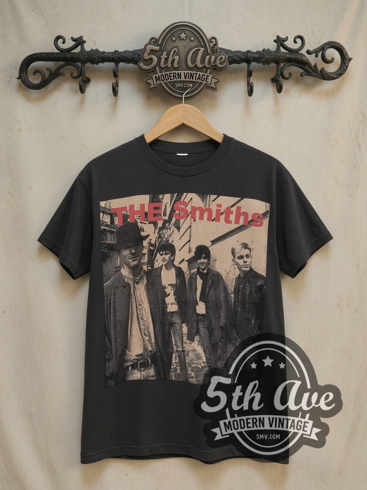 The Smiths Sepia Alleyway Band Photo Red Logo vintage band t-shirt, front view on a display rack