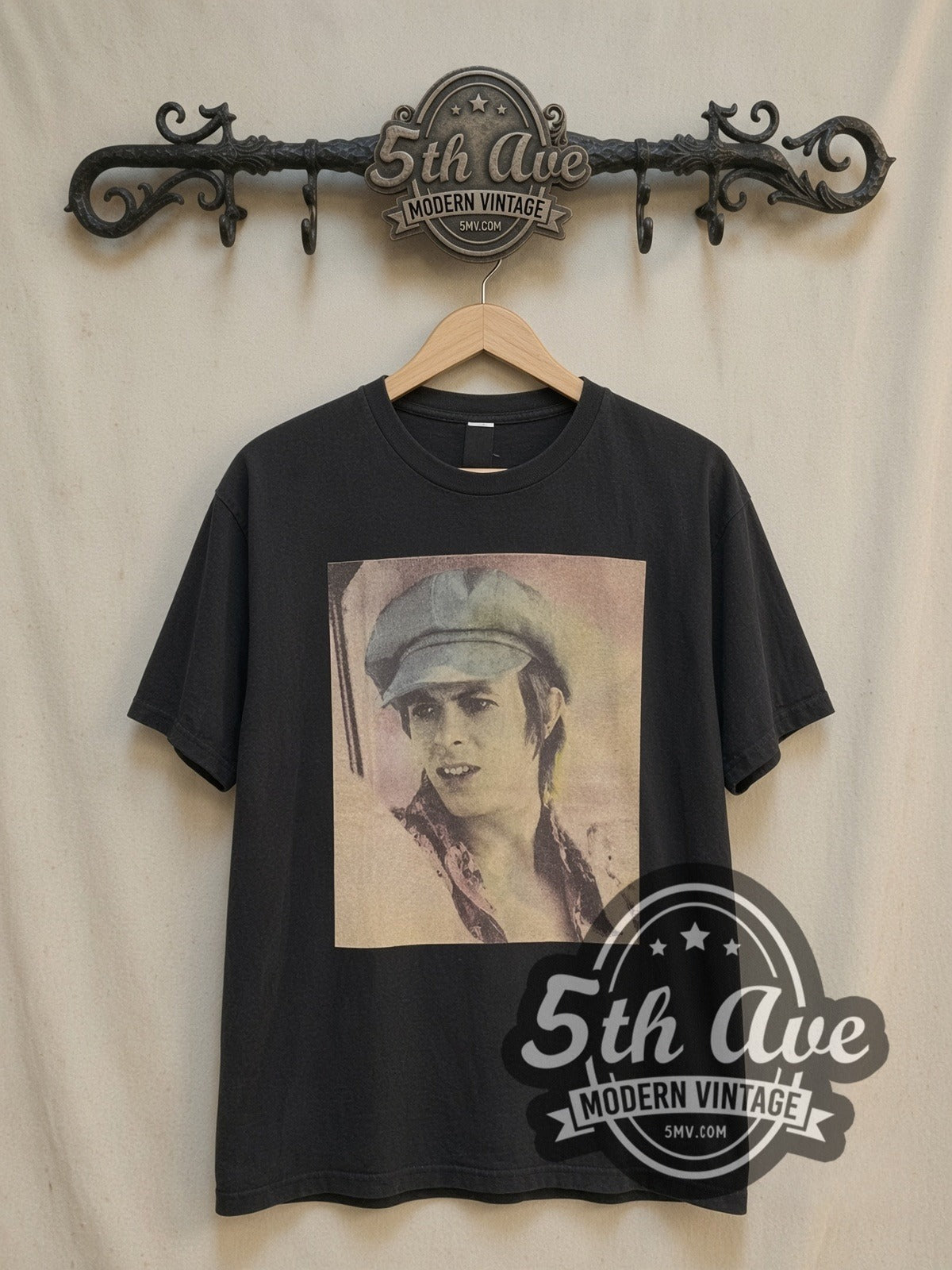 David Bowie Blue 70s Hat Portrait vintage band t-shirt, front view on a display rack