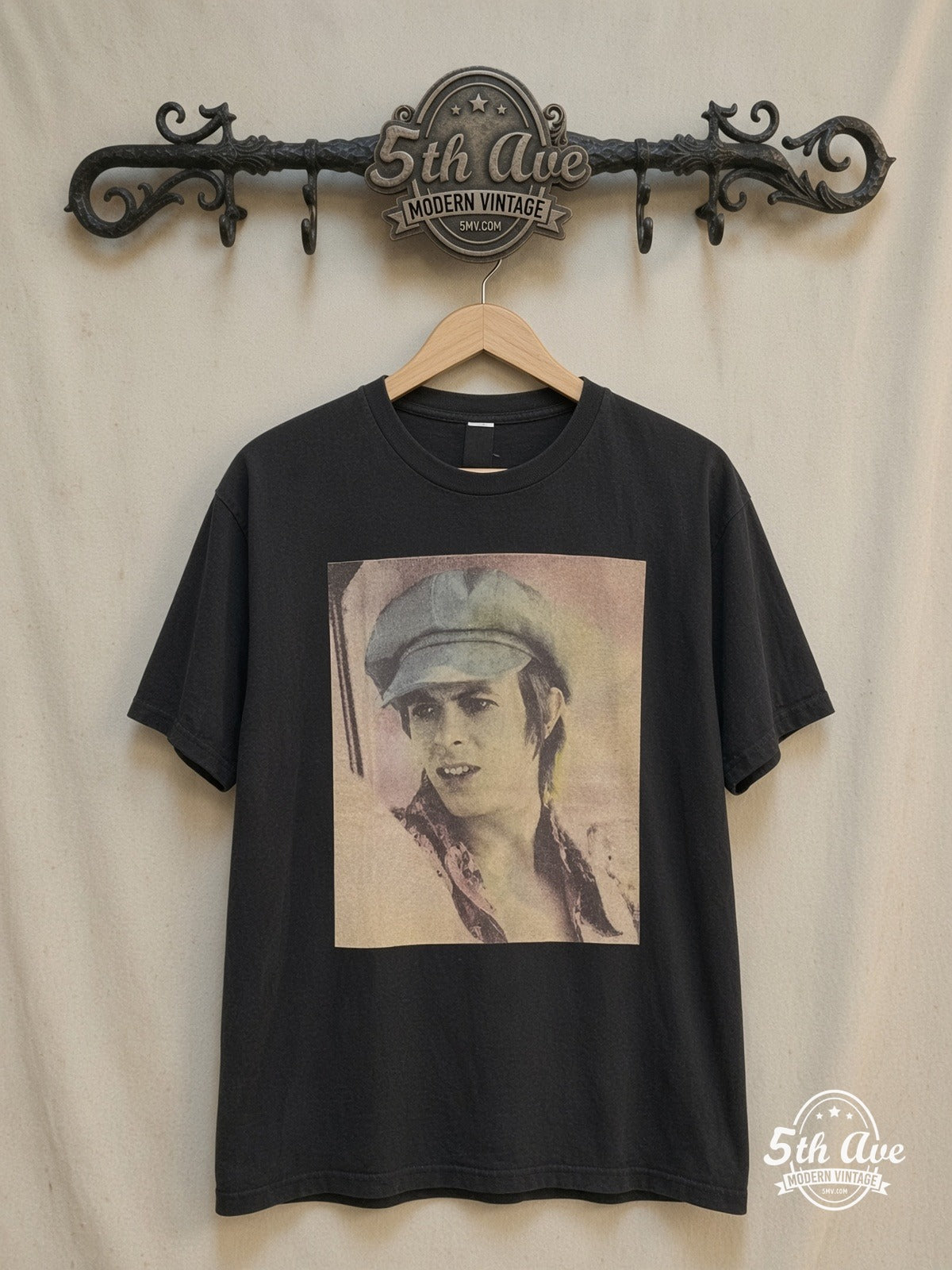 David Bowie – Blue 70s Hat Portrait – Vintage Band T-Shirt — front on locked cream ornate 5th Ave rack