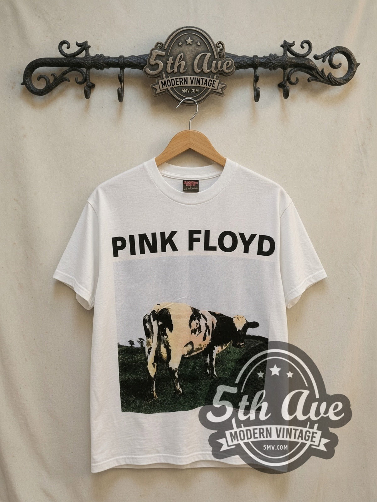 Pink Floyd Atom Heart Mother Cow Front vintage band t-shirt, front view on a display rack