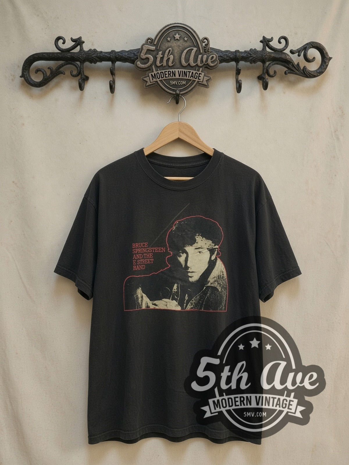 Bruce Springsteen vintage band t-shirt, front view on a display rack