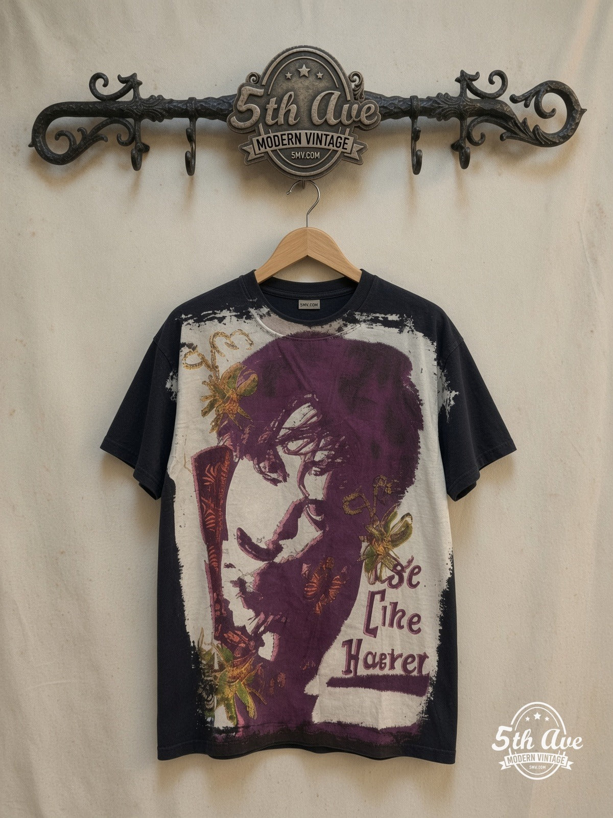 The Cure all over print T-Shirt — front on locked cream ornate 5th Ave rack