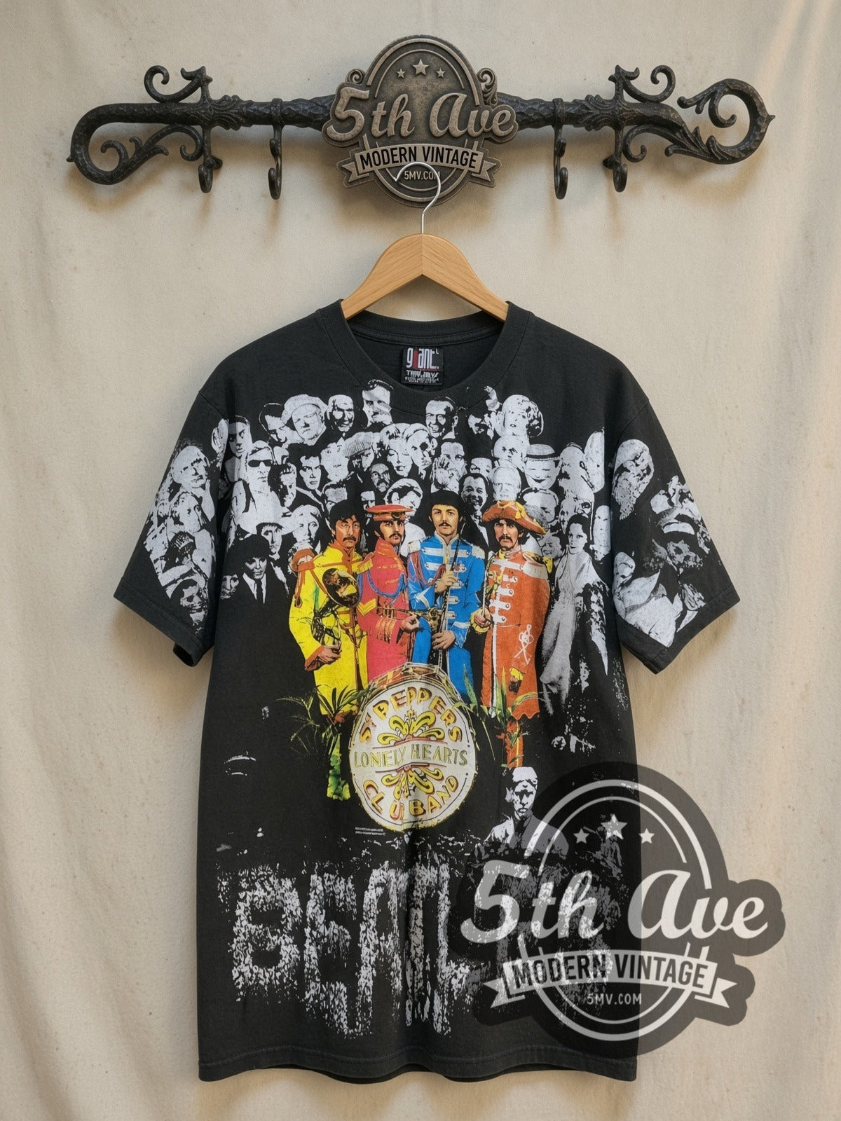 The Beatles Hearts vintage band t-shirt, front view on a display rack