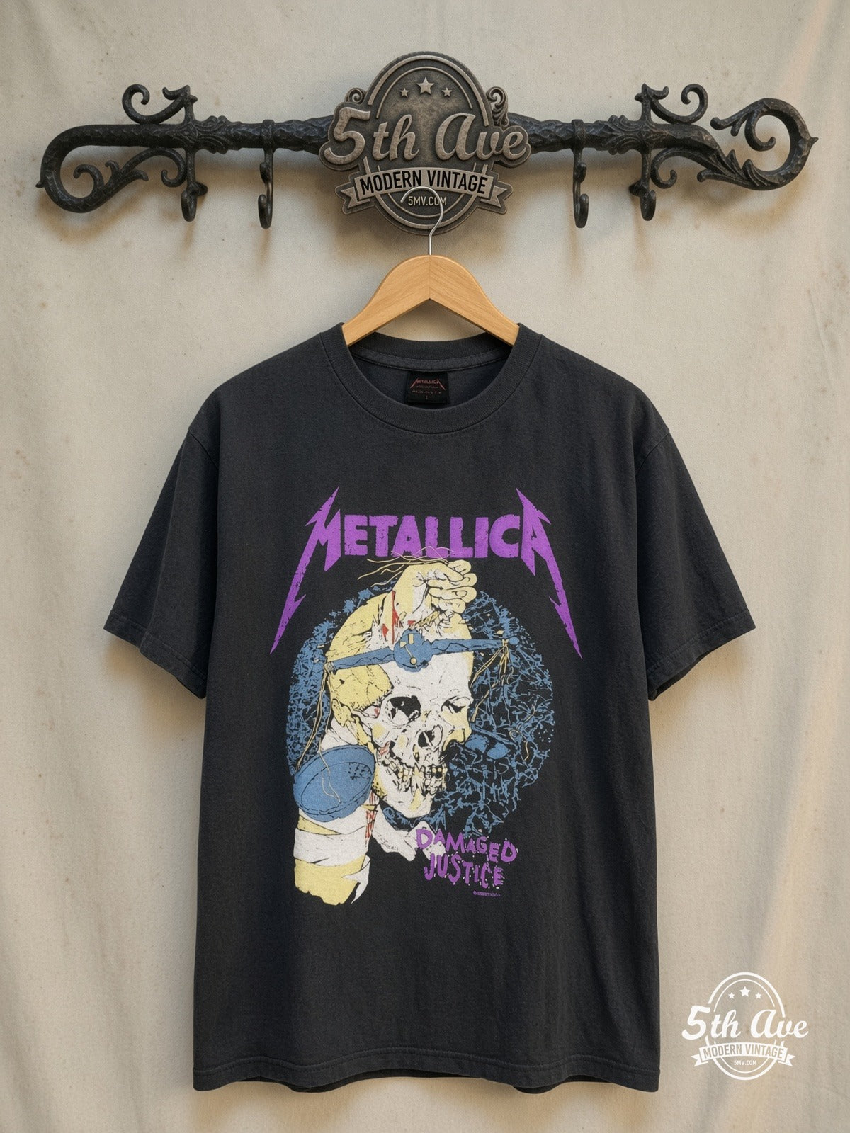 Metallica Damaged Justice vintage band t-shirt on rack