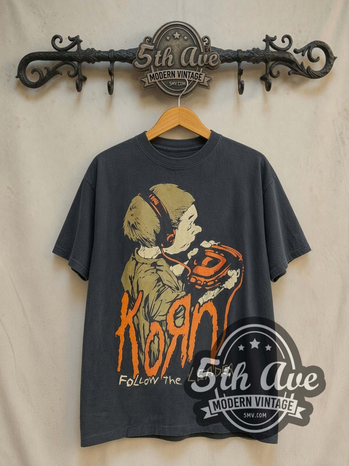 Korn Follow the Leader vintage band t-shirt in black, front view on a display rack