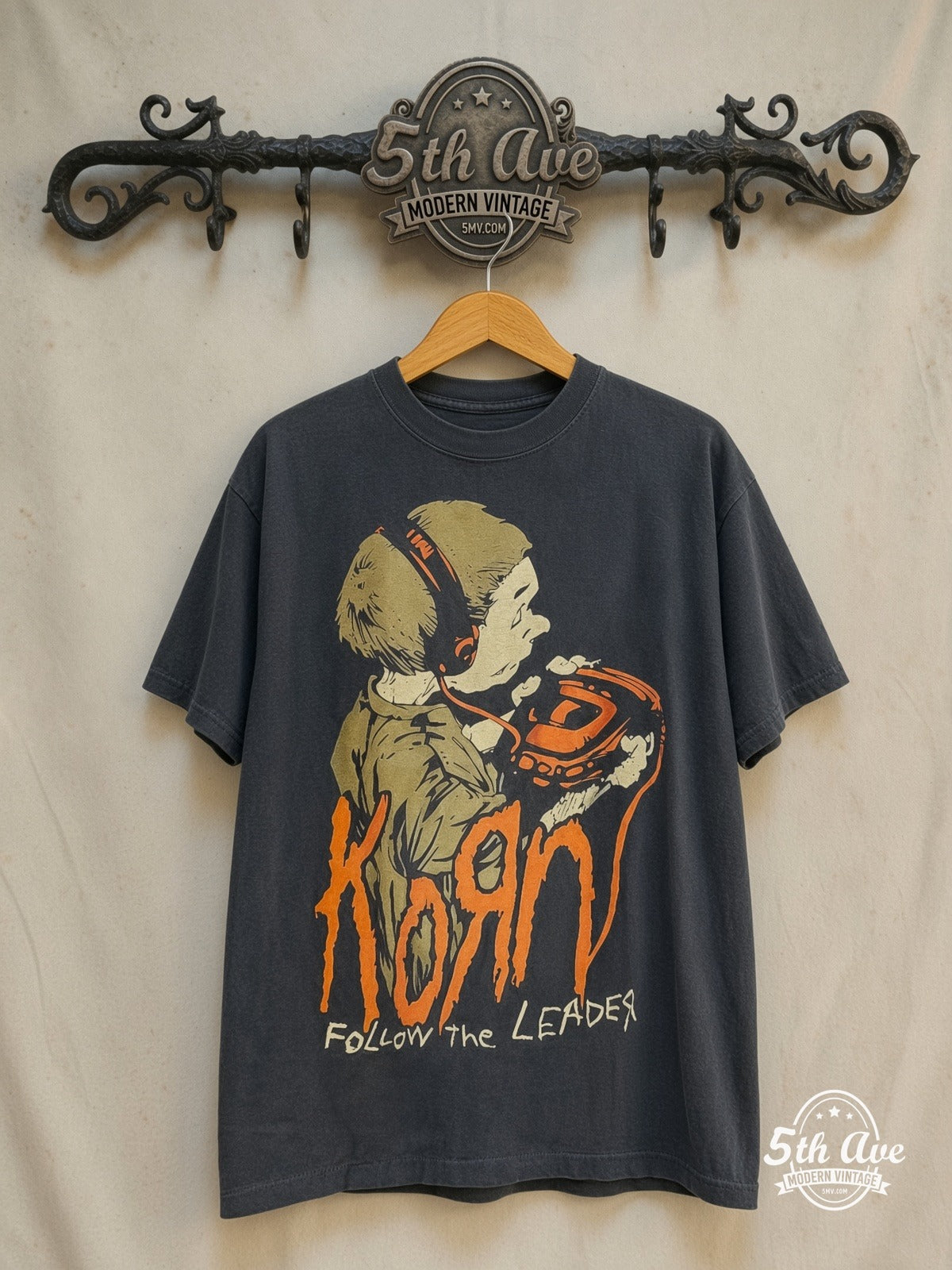 Korn – Follow the Leader – Vintage Band T-Shirt — front on locked cream ornate 5th Ave rack