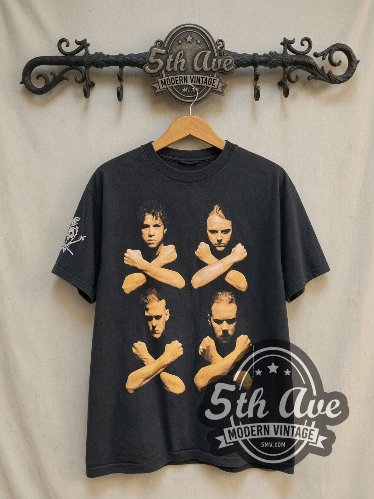 Metallica Birth School Four Members Crossed Arms vintage band t-shirt, front view on a display rack