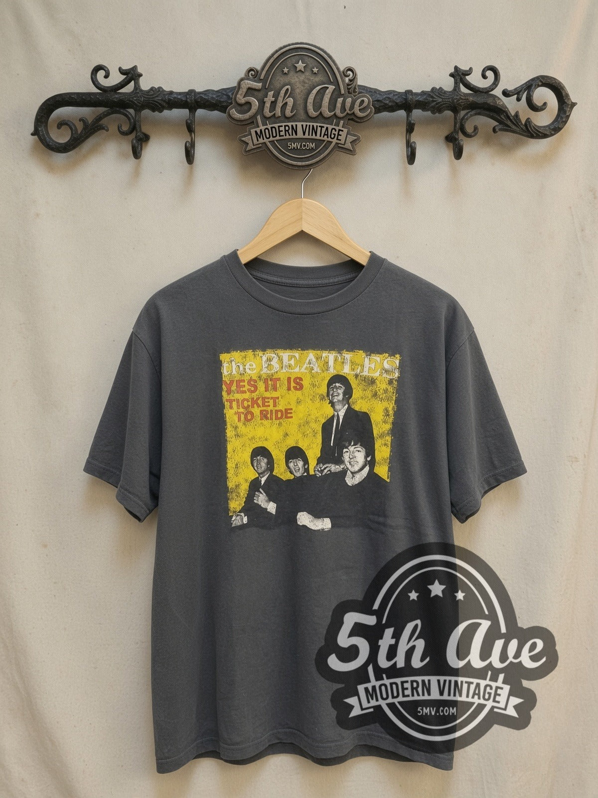 The Beatles TICKET TO RIDE vintage band t-shirt, front view on a display rack