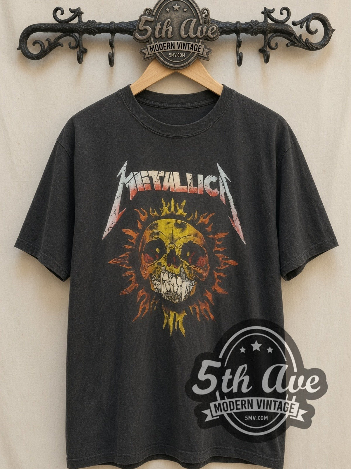 Metallica – Skull Sun with Flaming Skull Back vintage band t-shirt, front view on a display rack