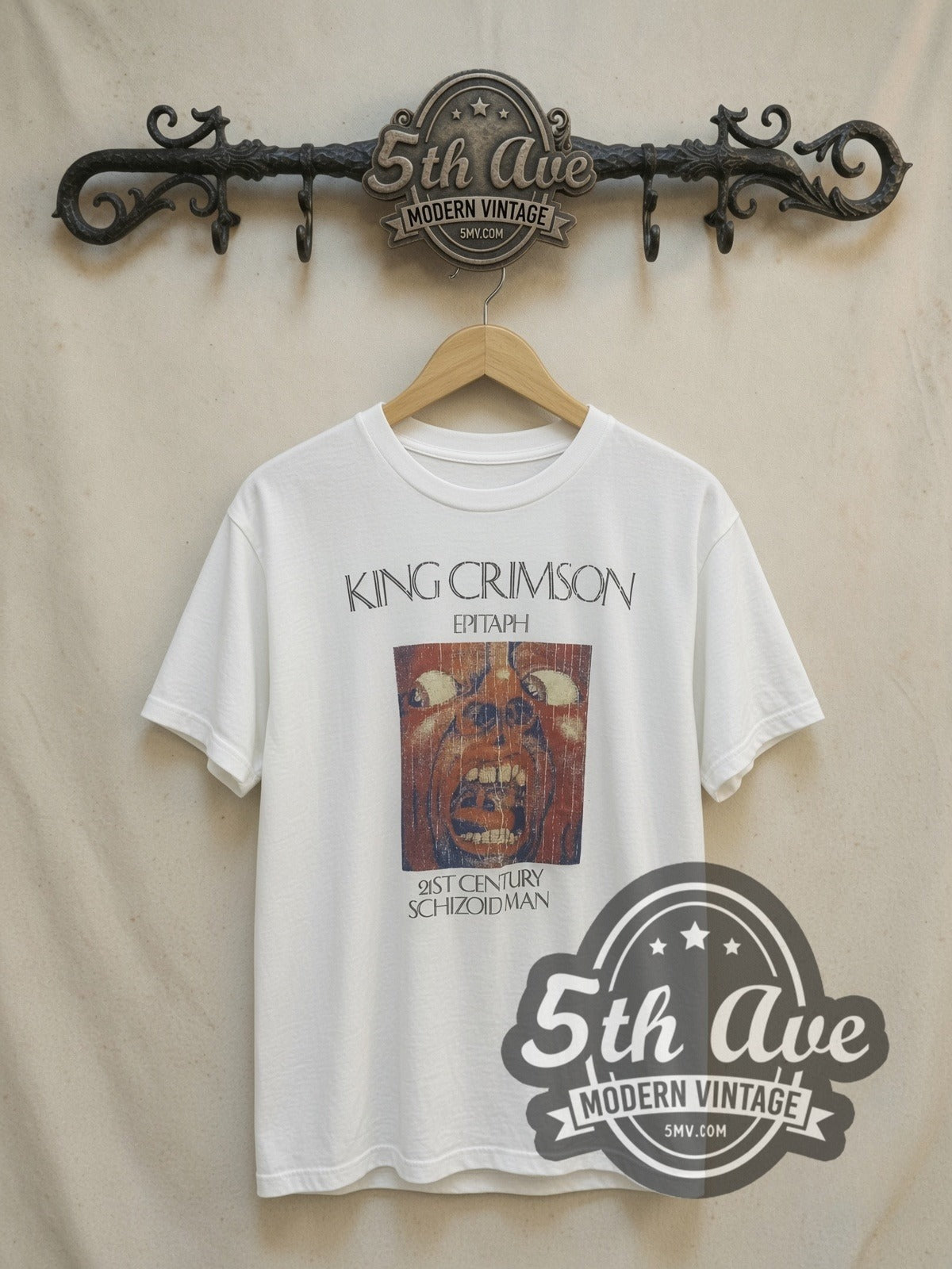King Crimson Epitaph Schizoid Man White vintage band t-shirt, front view on a display rack