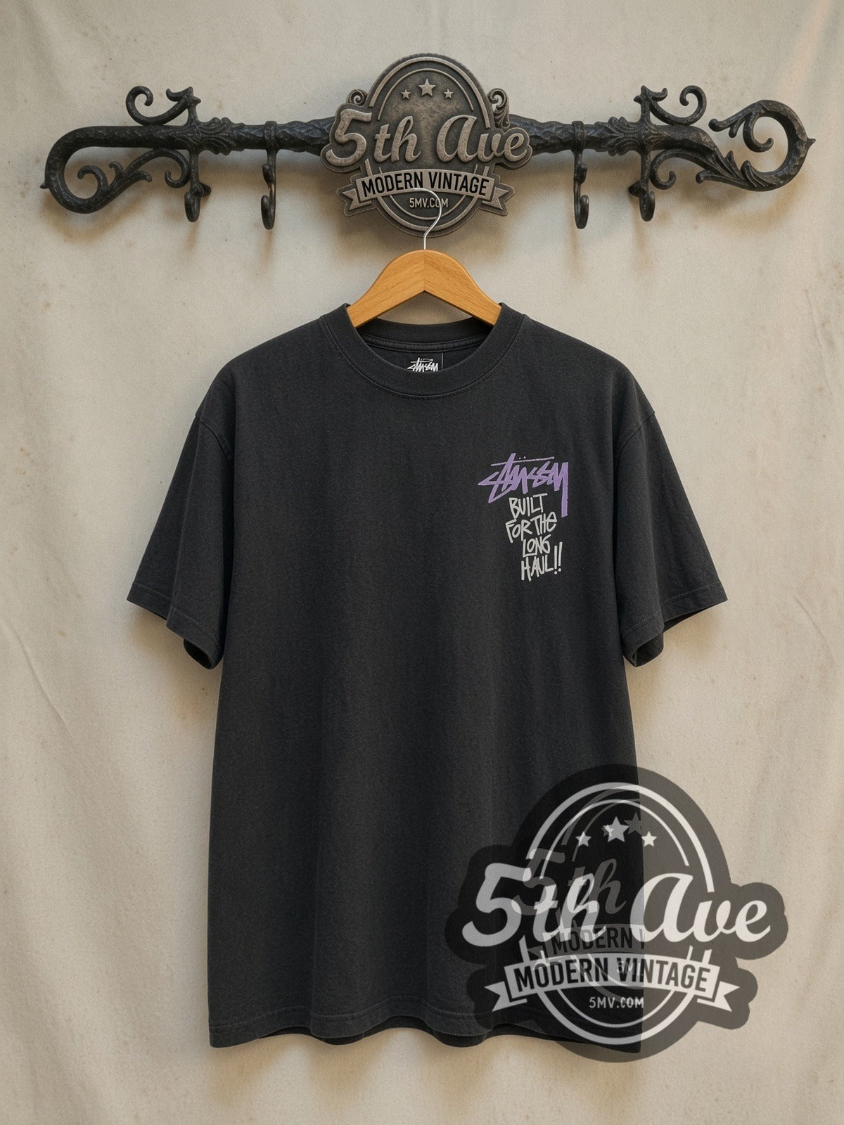 Stussy Built for the Long Haul vintage graphic tee in black, front view on the 5MV rack
