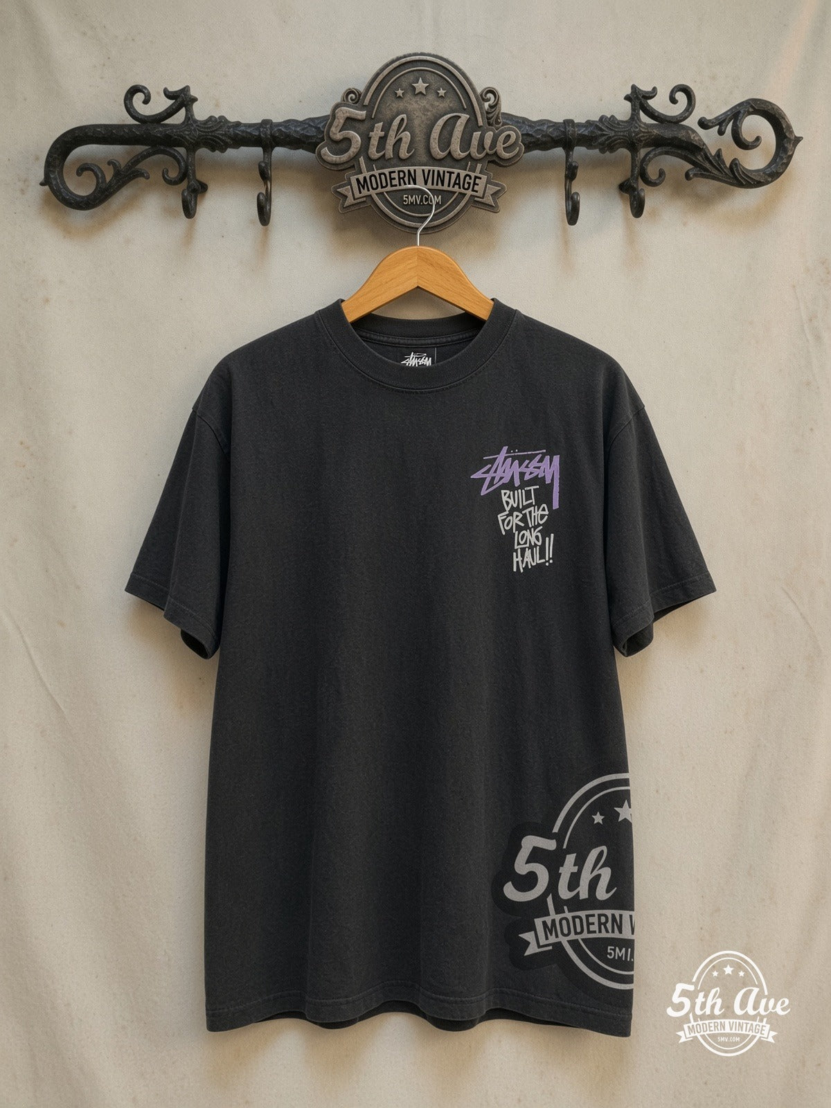 Stussy – Built for the Long Haul – Vintage Graphic Tee — front on locked cream ornate 5th Ave rack