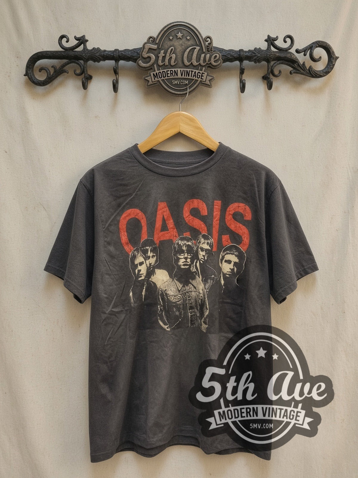 Oasis Bulls Legends vintage band t-shirt, front view on a display rack