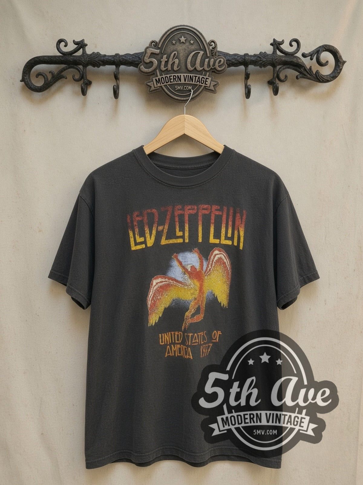 Led Zeppelin Icarus vintage band t-shirt, front view on a display rack