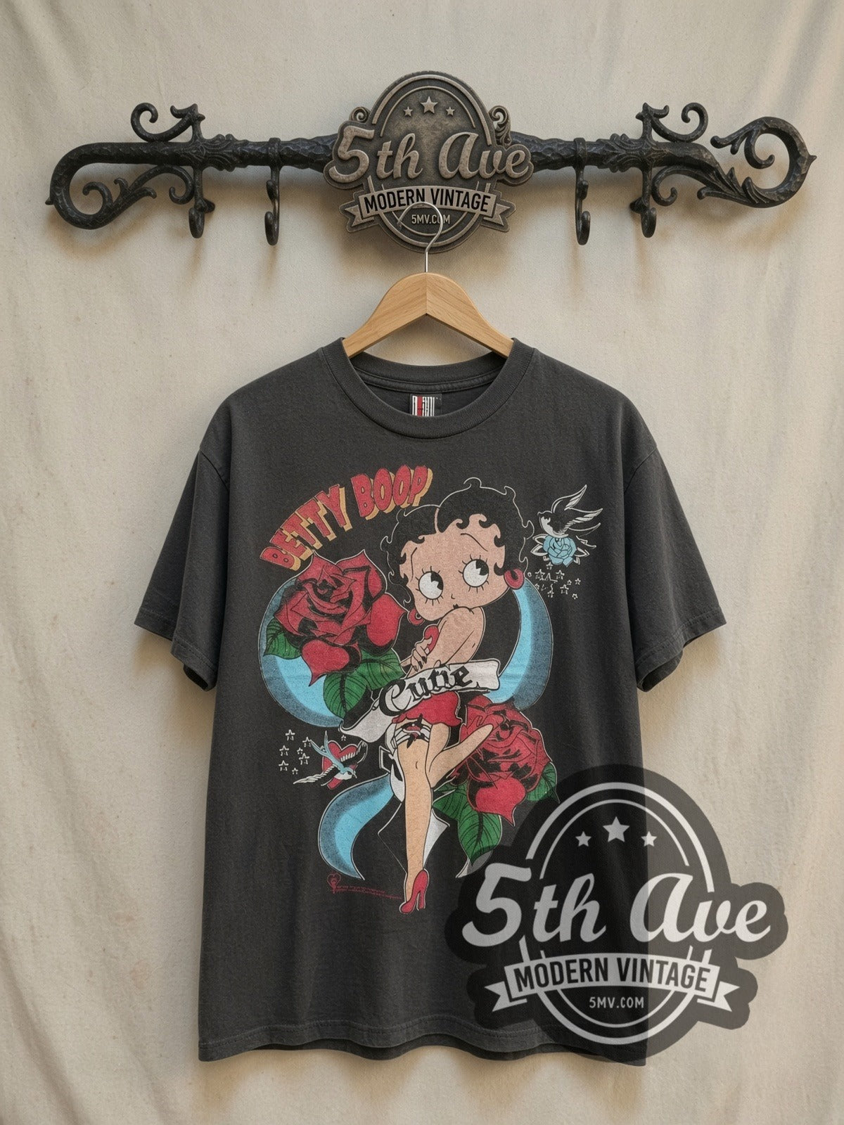 Betty Boop Cutie Tattoo Roses Black vintage cartoon tee in black, front view on a display rack