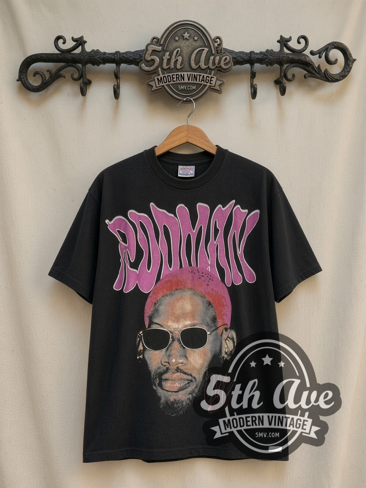 Dennis Rodman Pink Hair / The Worm 91 vintage graphic t-shirt, front view on a display rack