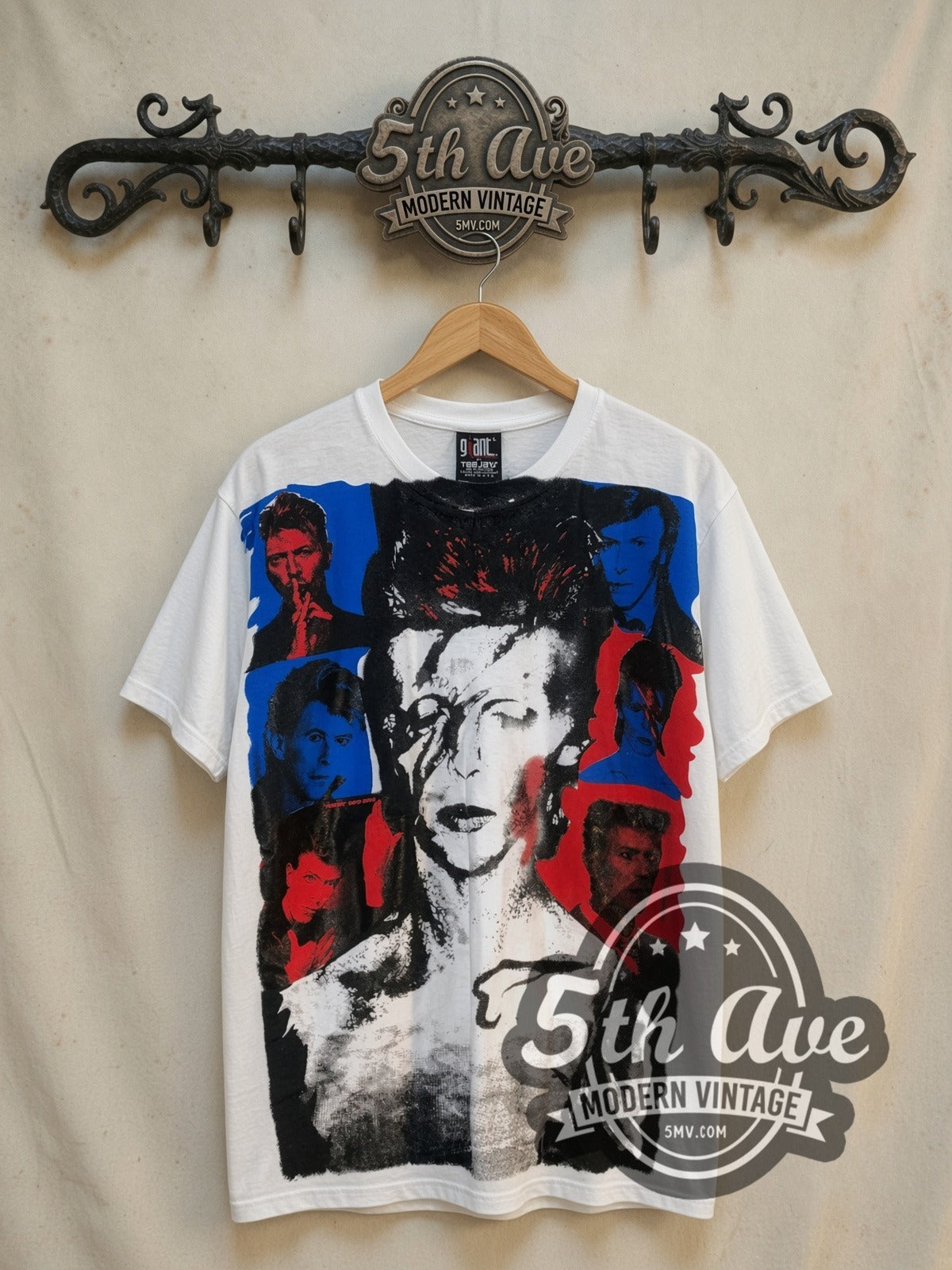 David Bowie Bowie Melodies Collage all-over-print vintage band t-shirt, front view on a display rack
