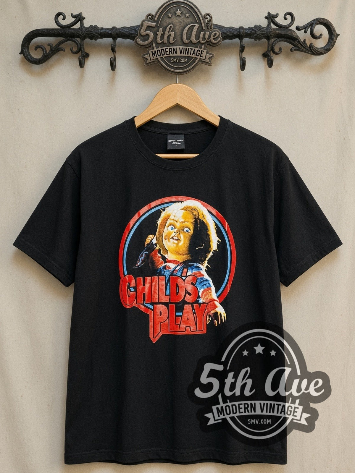 Child's Play Chucky Logo vintage movie t-shirt, front view on a display rack