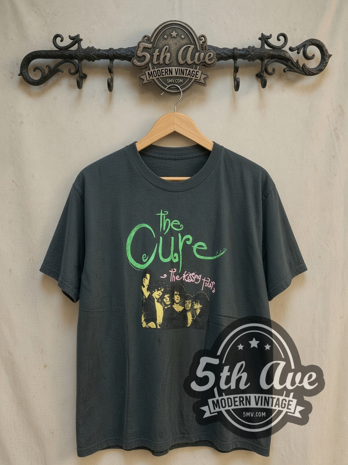 The Cure The Kissing Tour vintage band t-shirt, front view on a display rack