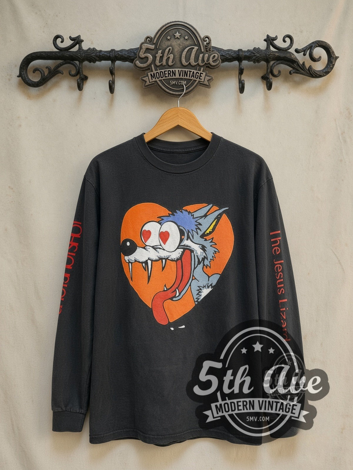 The Jesus Lizard You Idiot vintage band long sleeve t-shirt, front view on a display rack