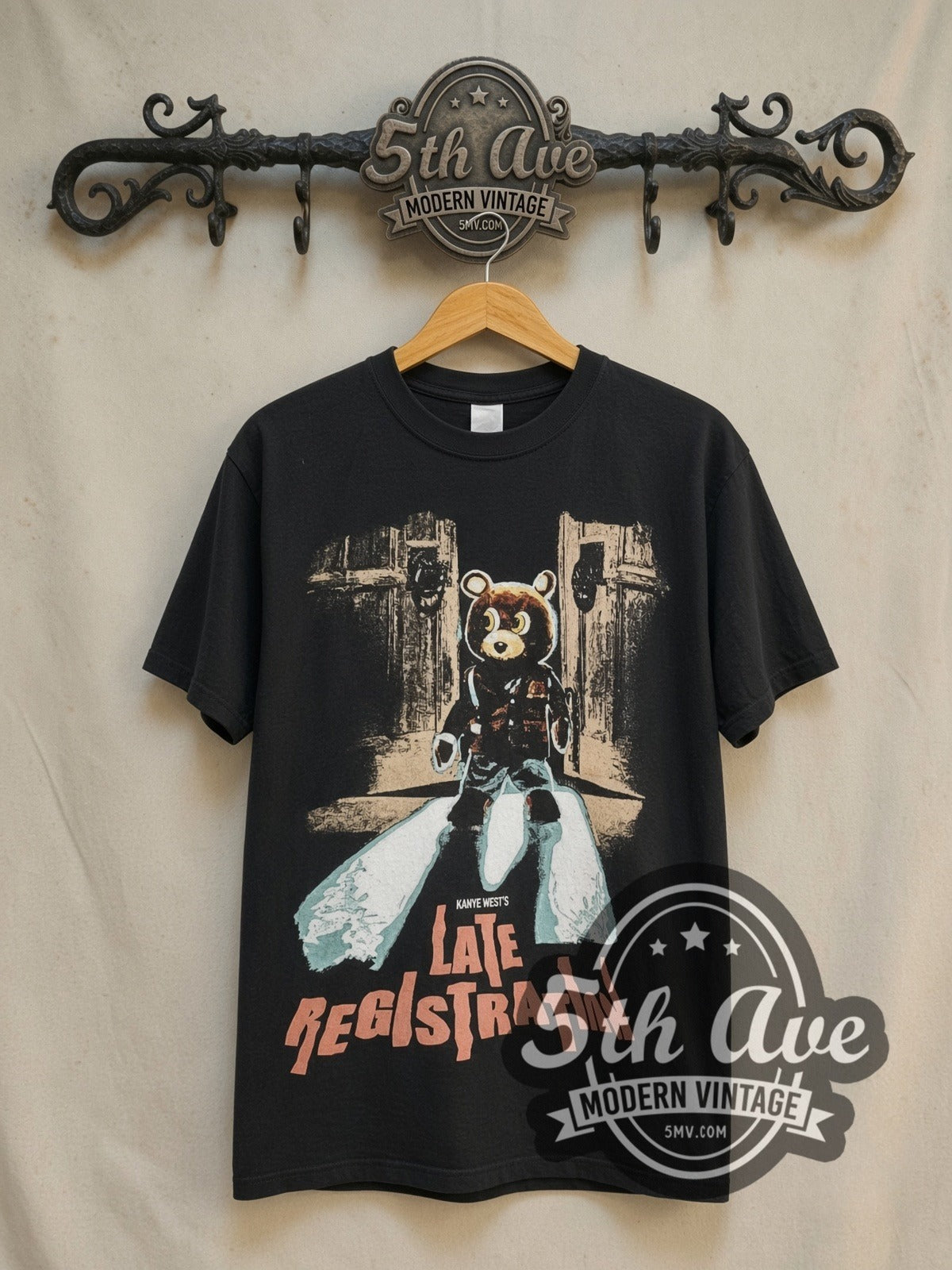 Kanye West Late Registration / Touch the Sky Tour 2005 vintage band t-shirt in black, front view on a display rack