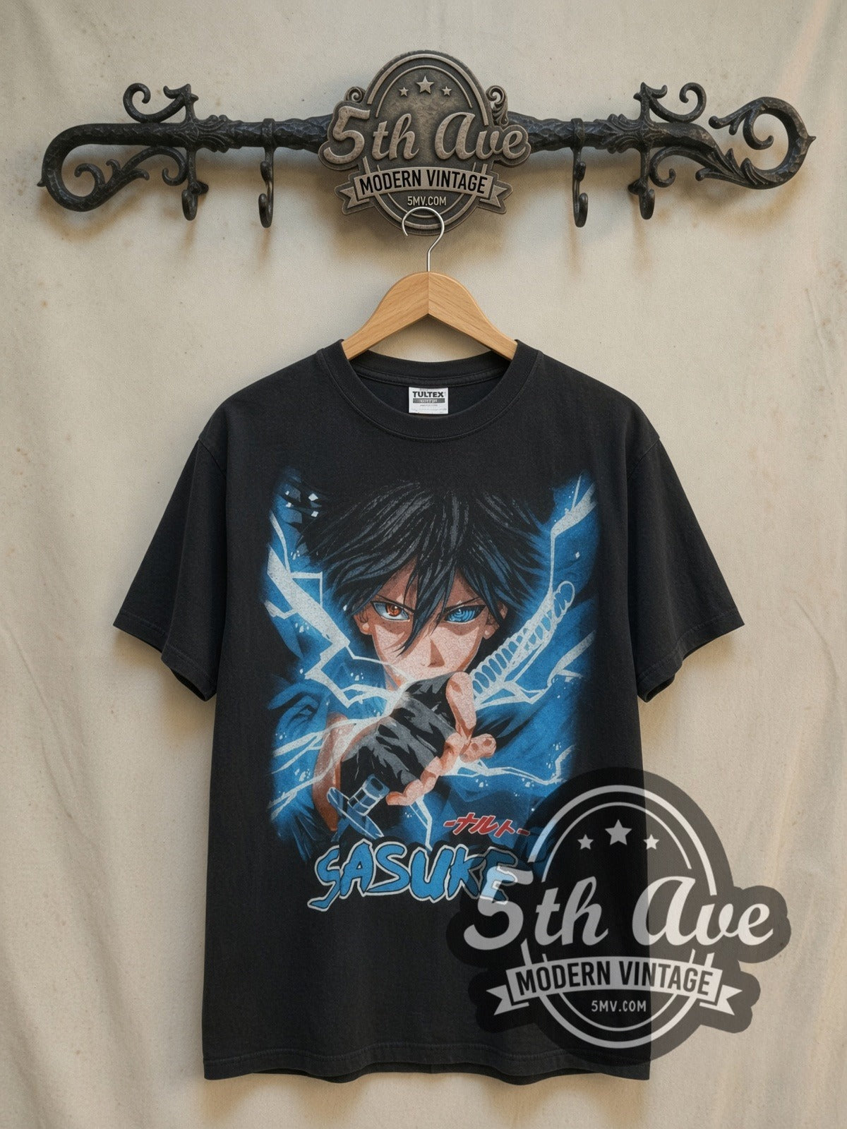 Naruto Shippuden Sasuke Uchiha vintage graphic t-shirt, front view on a display rack