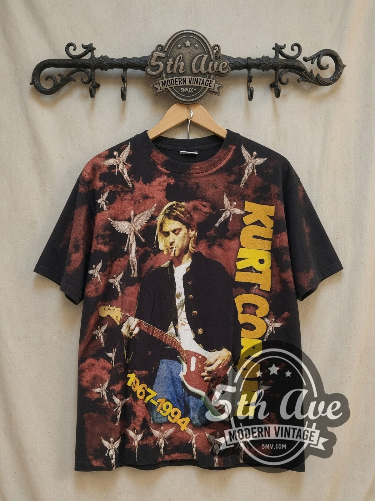 Nirvana Kurt Cobain 1967-1994 Angels all-over-print vintage band t-shirt, front view on the 5MV rack