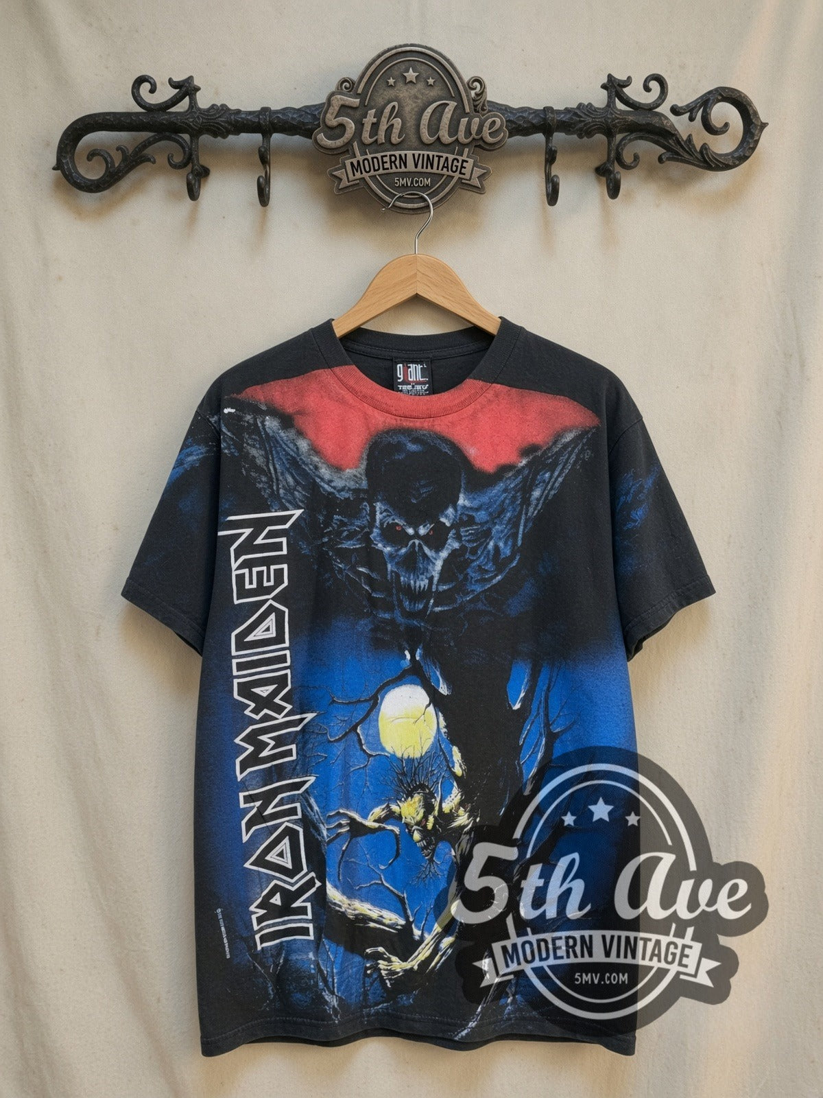 Iron Maiden Fear of the Dark Eddie Tree Spirit all-over-print vintage band t-shirt, front view on a display rack