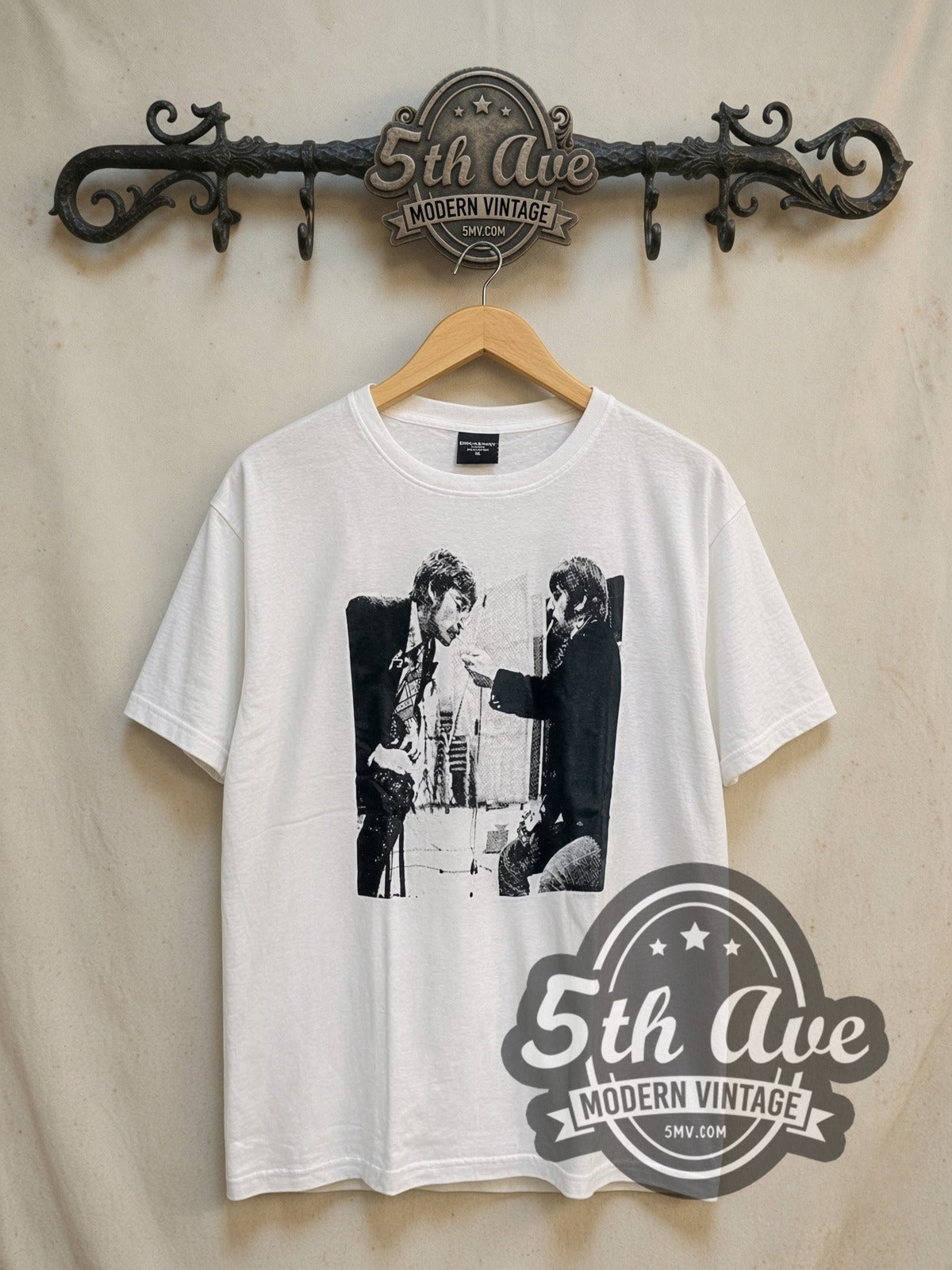 The Beatles Cigarettes vintage band t-shirt, front view on a display rack