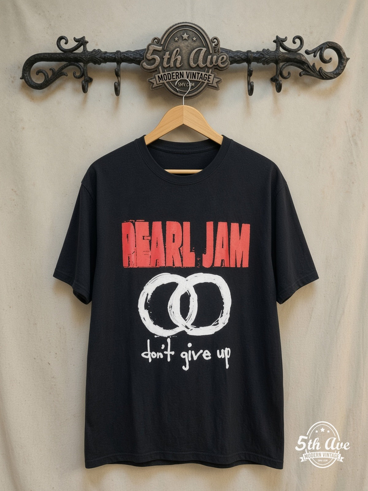 Pearl Jam – Don't Give Up – Vintage Band T-Shirt — front on locked cream ornate 5th Ave rack