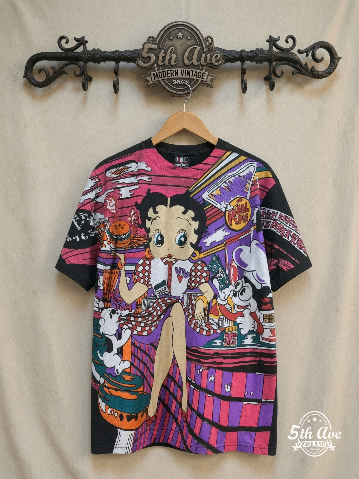 Betty Boop – Betty Boop's Diner Served Hot and Fresh – All Over Print – New Vintage Graphic Tee — front on locked cream ornate 5th Ave rack