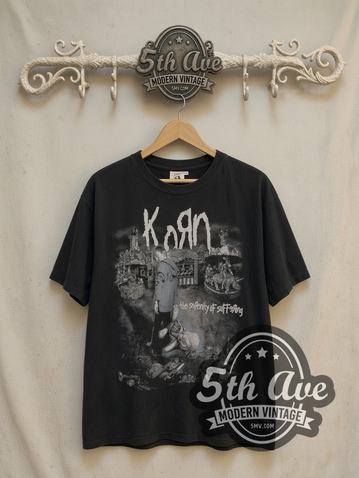Korn The Serenity of Suffering vintage band t-shirt, front view on a display rack