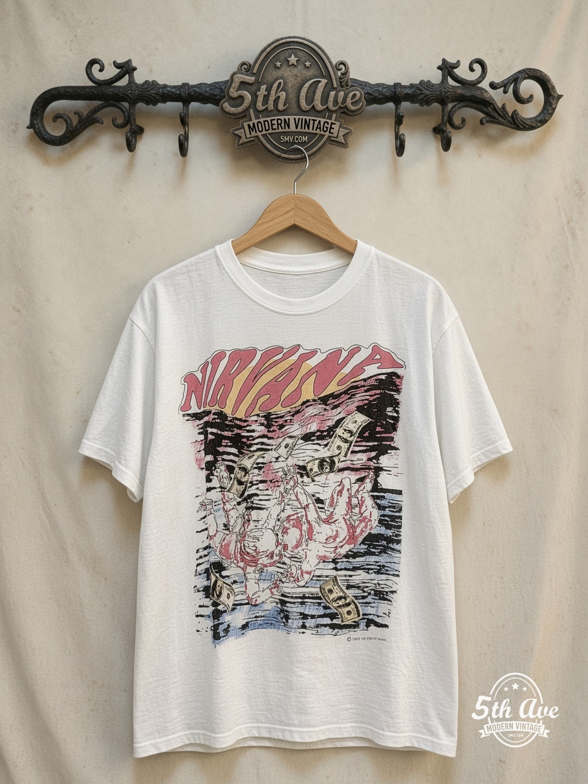 Nirvana – Nevermind Sketch Dollar Bills 1993 – Vintage Band T-Shirt — front on locked cream ornate 5th Ave rack