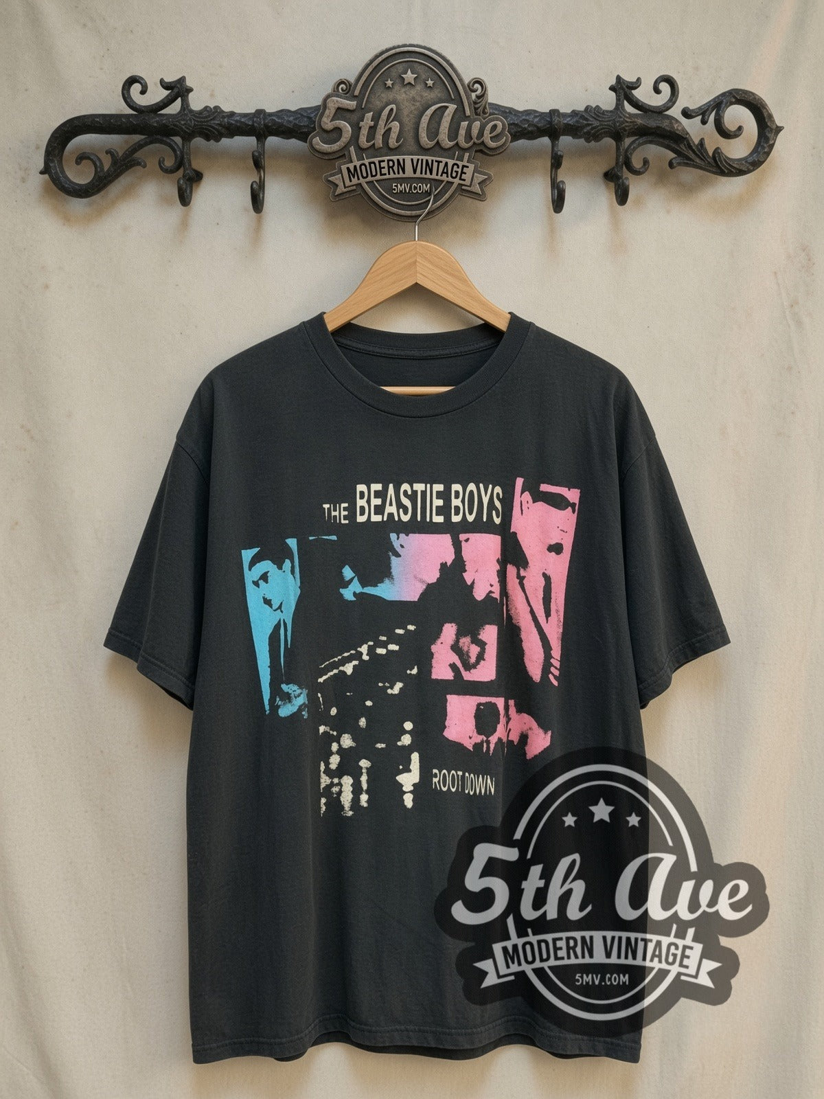 Beastie Boys Root Down vintage rap tee, front view on a display rack