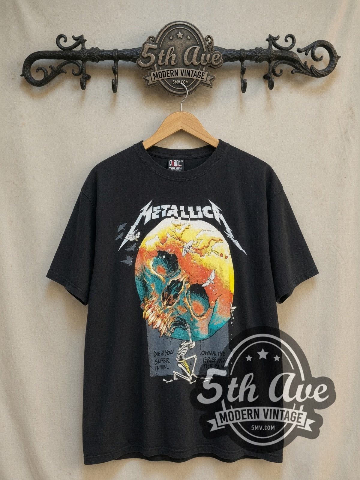 Metallica Atlas, Rise! vintage band t-shirt, front view on a display rack