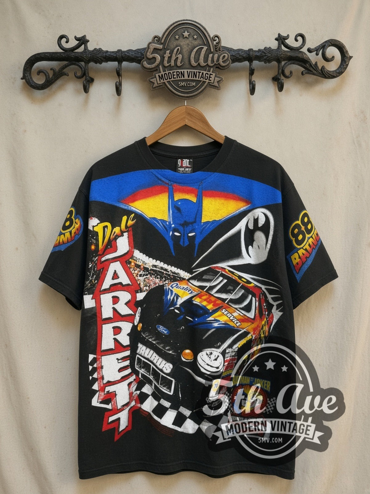 NASCAR Dale Jarrett Batman Ford Taurus Black all-over-print vintage graphic t-shirt, front view on a display rack