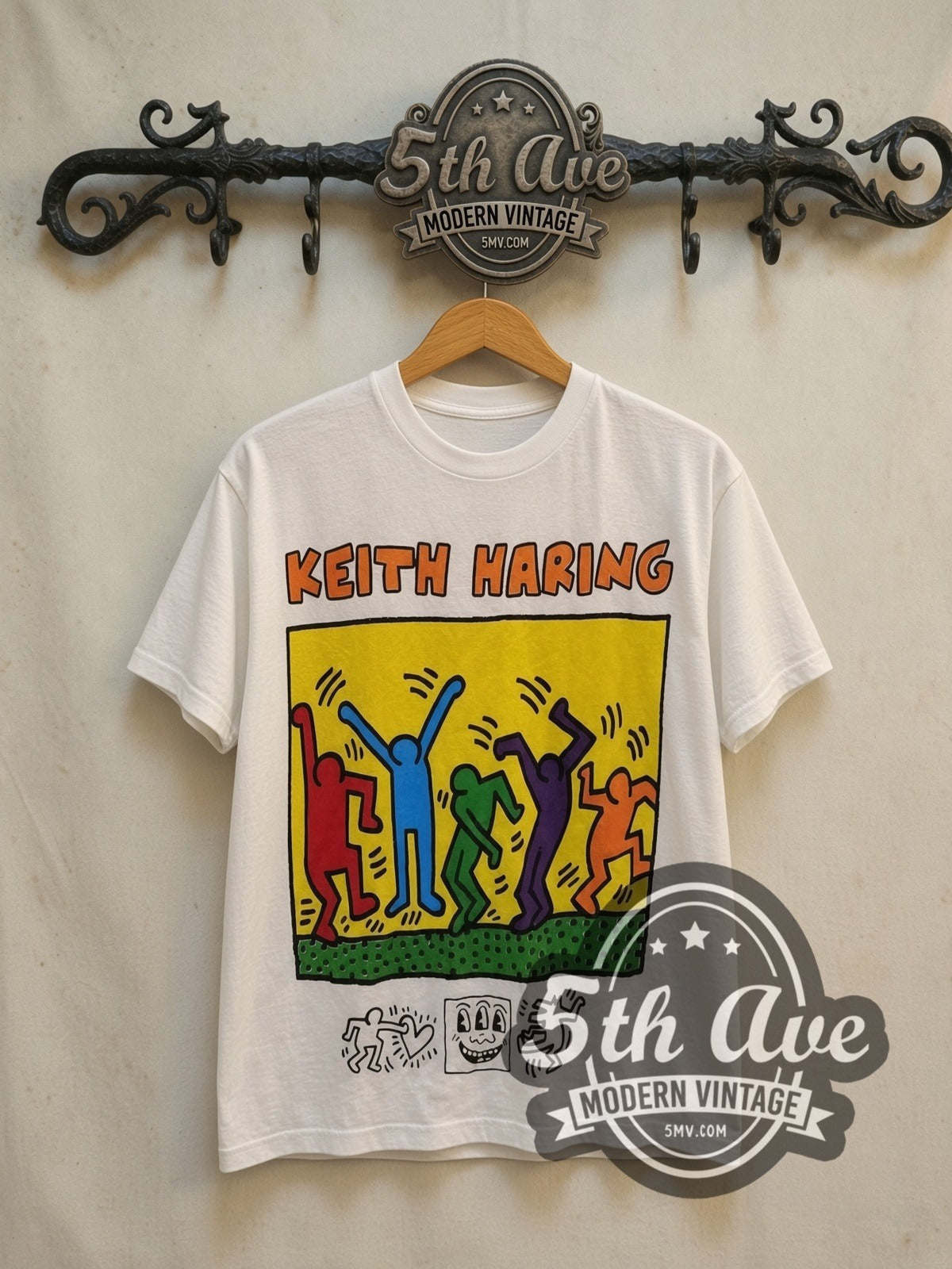 Keith Haring vintage graphic tee, front view on a display rack