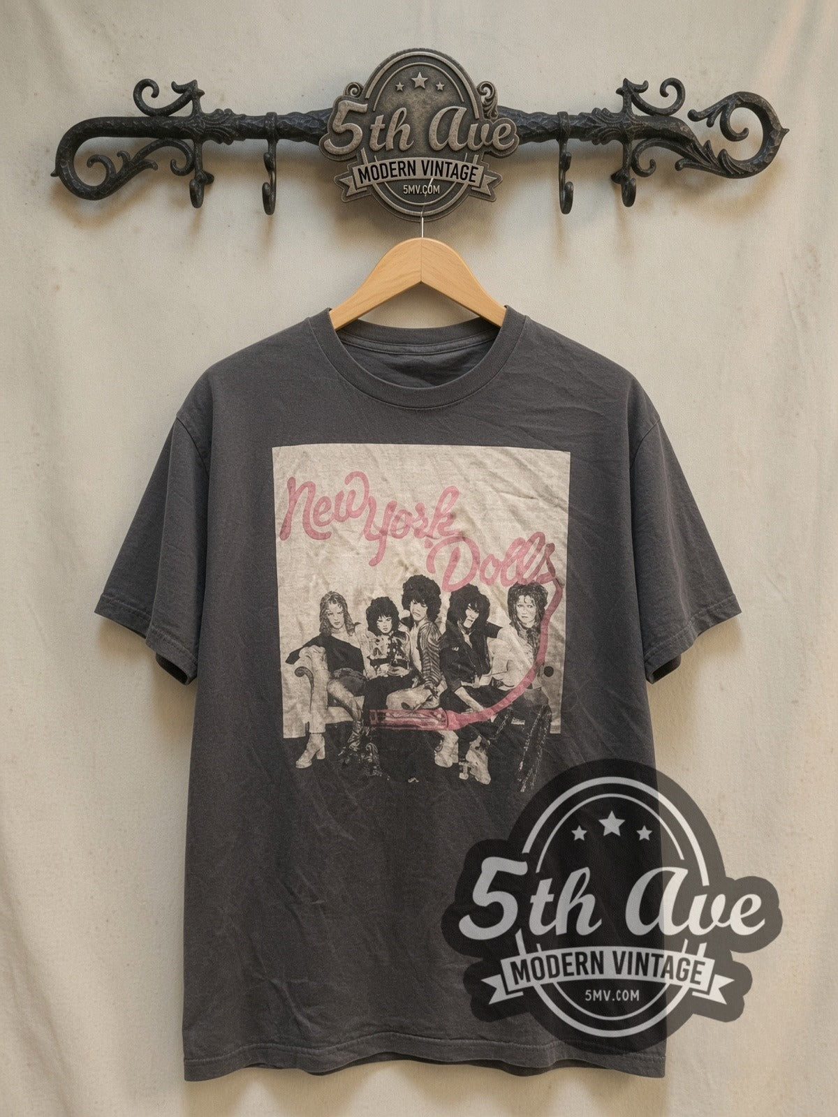New York Dolls vintage band t-shirt, front view on a display rack