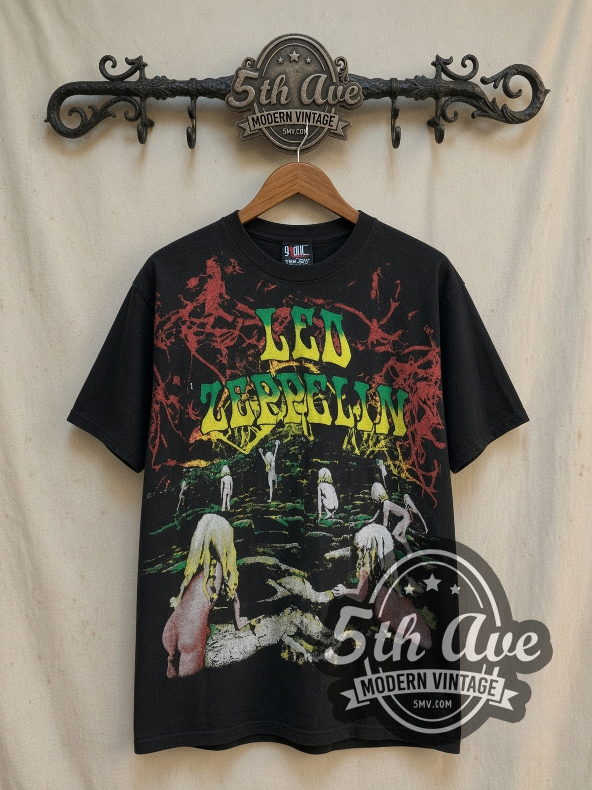 Led Zeppelin Houses of the Holy vintage band t-shirt, front view on a display rack