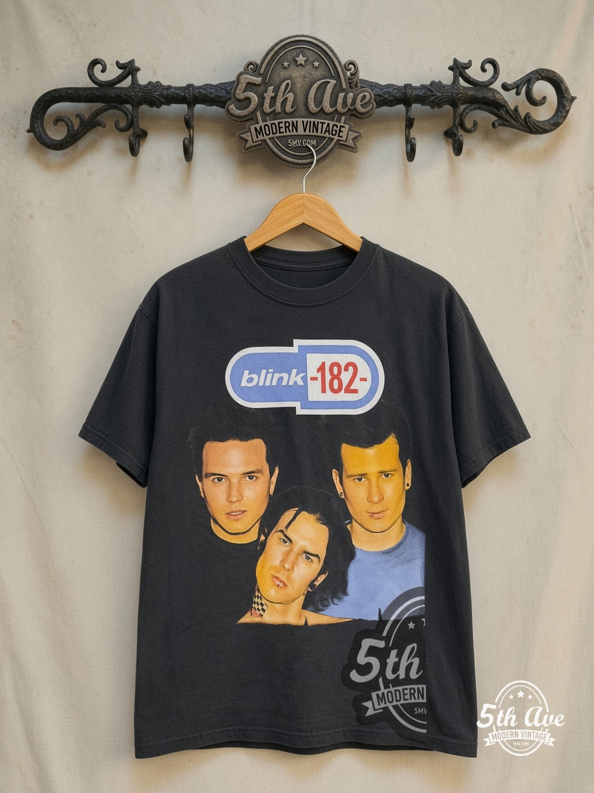 Blink-182 – The Mark, Tom and Travis Show – Vintage Band T-Shirt — front on locked cream ornate 5th Ave rack