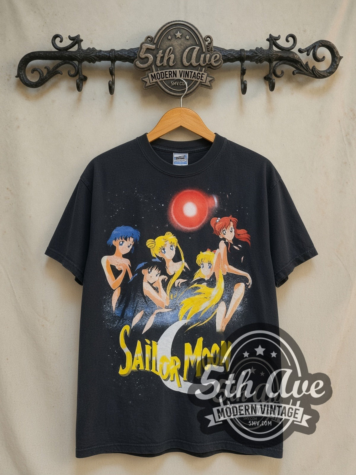 Sailor Moon Five Sailor Guardians Transform vintage graphic t-shirt, front view on a display rack