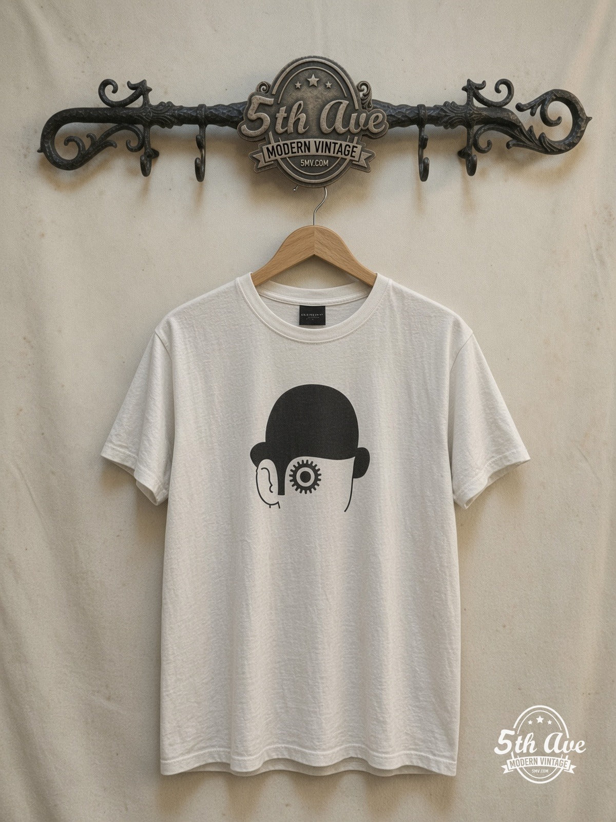 A Clockwork Orange – Minimal Bowler Hat Gear Eye – Vintage Movie Tee — front on locked cream ornate 5th Ave rack